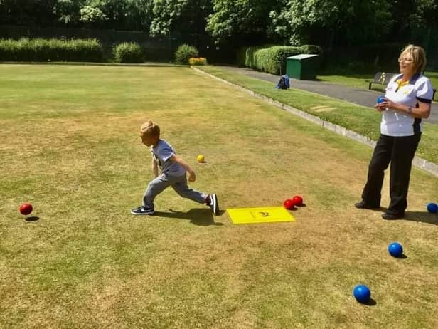 The community taking part in bowls at Jarrow West Park