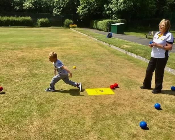 The community taking part in bowls at Jarrow West Park