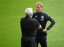 Newcastle United's English head coach Steve Bruce (L) chats with Brighton's English manager Graham Potter (R) on the pitch ahead of the English Premier League football match between Newcastle United and Brighton and Hove Albion at St James' Park in Newcastle upon Tyne, north-east England on September 20, 2020.