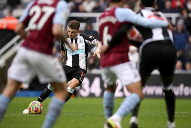 Kieran Trippier of Newcastle United scorestheir sides first goal from a free kick during the Premier League match between Newcastle United and Aston Villa at St. James Park on February 13, 2022 in Newcastle upon Tyne, England. (Photo by George Wood/Getty Images)