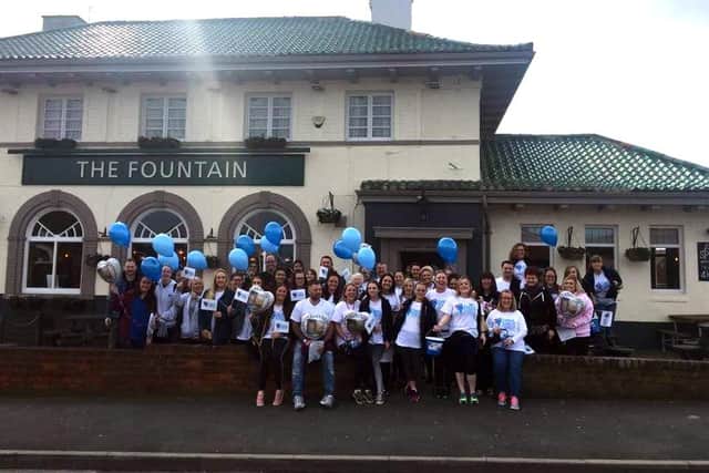 Fundraisers take part in last year's pub crawl.