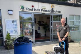 Ruck Engineering’s Graham Chadwick delivering pressure washer to Red Hall Primary School