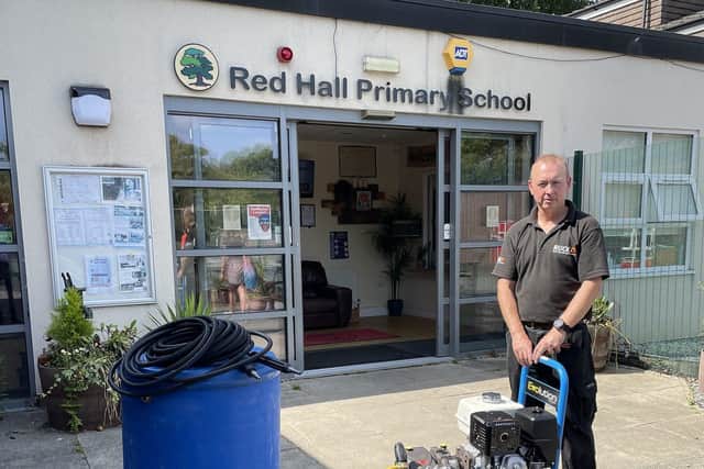 Ruck Engineering’s Graham Chadwick delivering pressure washer to Red Hall Primary School
