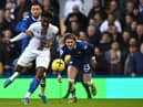 Crystal Palace's English midfielder Eberechi Eze (C) is held back by Chelsea's Moroccan midfielder Hakim Ziyech (L) as Conor Gallagher watches on during the English Premier League football match between Chelsea and Crystal Palace at Stamford Bridge in London on January 15, 2023.  (Photo by BEN STANSALL/AFP via Getty Images)