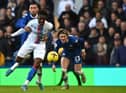 Crystal Palace's English midfielder Eberechi Eze (C) is held back by Chelsea's Moroccan midfielder Hakim Ziyech (L) as Conor Gallagher watches on during the English Premier League football match between Chelsea and Crystal Palace at Stamford Bridge in London on January 15, 2023.  (Photo by BEN STANSALL/AFP via Getty Images)