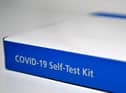 An NHS Covid-19 Self-Test Kit, containing a lateral flow test. (Photo by BEN STANSALL/AFP via Getty Images)