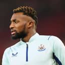 NOTTINGHAM, ENGLAND - MARCH 17: Allan Saint-Maximin of Newcastle United looks on as he warms up prior to the Premier League match between Nottingham Forest and Newcastle United at City Ground on March 17, 2023 in Nottingham, England. (Photo by Laurence Griffiths/Getty Images)