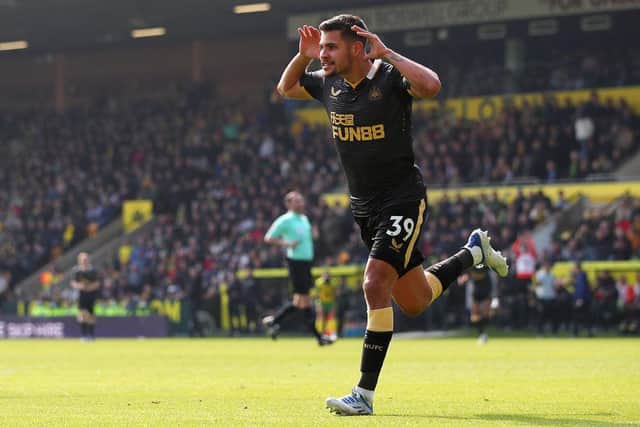 Bruno Guimaraes of Newcastle United celebrates after scoring their side's third goal during the Premier League match between Norwich City and Newcastle United at Carrow Road on April 23, 2022 in Norwich, England. (Photo by Marc Atkins/Getty Images)