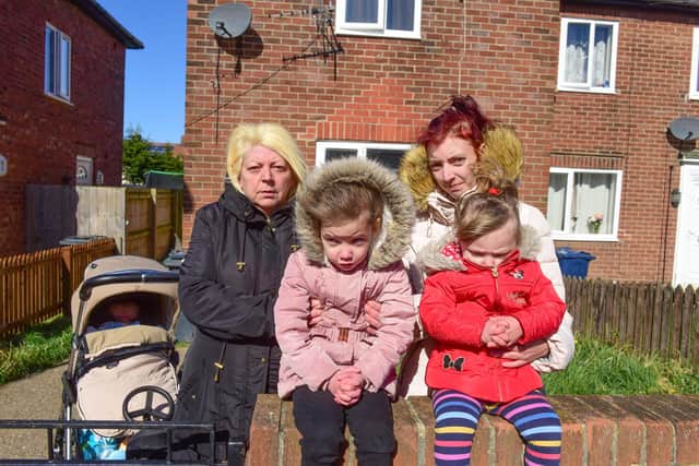 (Right) Margaret Holden outside of her home on Farne Avenue South Shields, with children Lacey, four, Melissa, two, and 10 month old William and mother June Holden (left).