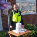 Mary celebrating her 90th birthday with PC Neil Morris and PCSO Gayle Muizelaar. 
Image by Northumbria Police.