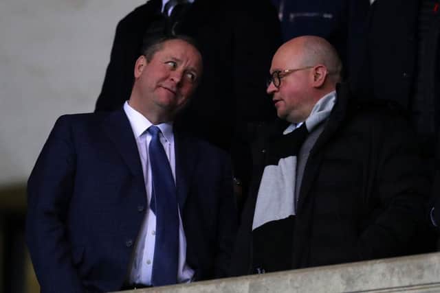 Mike Ashley owner of Newcastle United talks to managing Directory Lee Charnley.