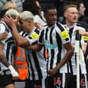 Joelinton of Newcastle United celebrates after scoring the team's second goal with Bruno Guimaraes of Newcastle United during the Premier League match between Newcastle United and Tottenham Hotspur at St. James Park on April 23, 2023 in Newcastle upon Tyne, England. (Photo by Clive Brunskill/Getty Images)