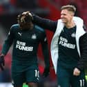 Matty Ritchie congratulates Allan Saint-Maximin.