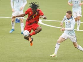 Belgium's Johan Bakayoko and Scotland's Elliot Anderson fight for the ball during a soccer game between the U21 teams of Belgium and Scotland, Sunday 05 June 2022 in Sint-Truiden, the last qualification match (out of 8) in the group I, for the 2023 Under-21 European Championships. (Photo by BRUNO FAHY/BELGA MAG/AFP via Getty Images)