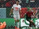 Portugal's defender #03 Pepe celebrates next to Switzerland's defender #22 Fabian Schaer after scoring his team's second goal with a header past Switzerland's goalkeeper #01 Yann Sommer during the Qatar 2022 World Cup round of 16 football match between Portugal and Switzerland at Lusail Stadium in Lusail, north of Doha on December 6, 2022. (Photo by JEWEL SAMAD/AFP via Getty Images)