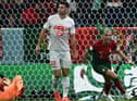 Portugal's defender #03 Pepe celebrates next to Switzerland's defender #22 Fabian Schaer after scoring his team's second goal with a header past Switzerland's goalkeeper #01 Yann Sommer during the Qatar 2022 World Cup round of 16 football match between Portugal and Switzerland at Lusail Stadium in Lusail, north of Doha on December 6, 2022. (Photo by JEWEL SAMAD/AFP via Getty Images)