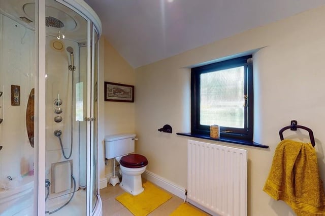 The en-suite has a shower cubicle with overhead and hand-held shower sprays, body jets, steam facility, and foot massager.  There are  'his and hers' wash basins and a wc.