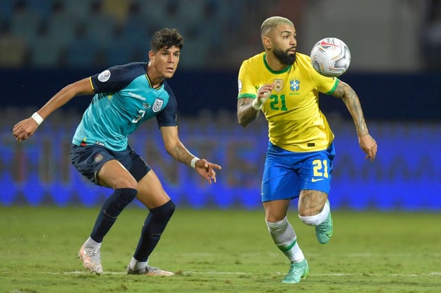 Piero Hincapie of Ecuador competes for the ball with Gabriel Barbosa of Brazil.
