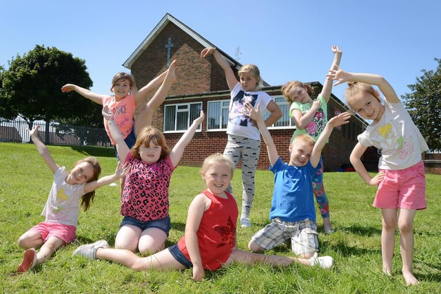 Children from Redhouse taking part in dance lessons in the sun at Redhouse Methodist Church as part of the summer activities organised by I Am Sports in 2014.