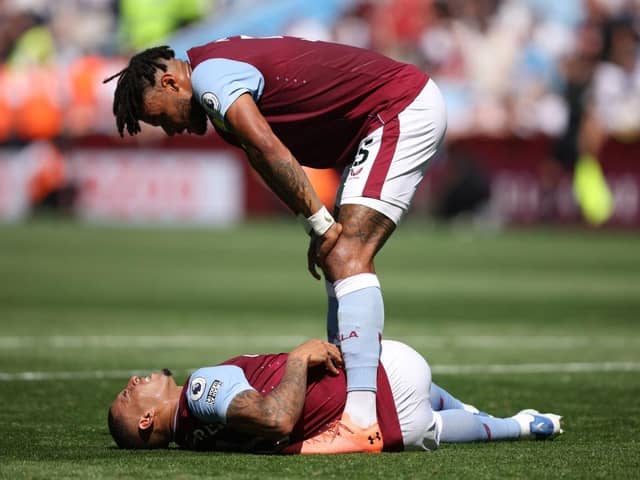 Tyrone Mings and Diego Carlos of Aston Villa react during the Premier League match between Aston Villa and Everton FC at Villa Park on August 13, 2022 in Birmingham, England. (Photo by Marc Atkins/Getty Images)