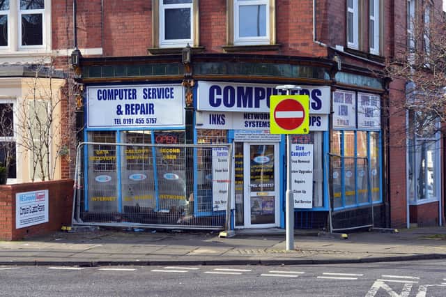 Front of NECS Computer Repairs following a blue Ford Mondeo smashing into the shop.
