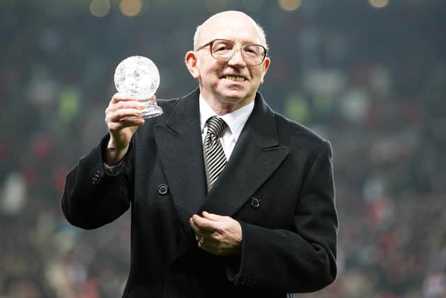 1966 World Cup winner Nobby Stiles is presented with an award on the pitch prior to kick off.