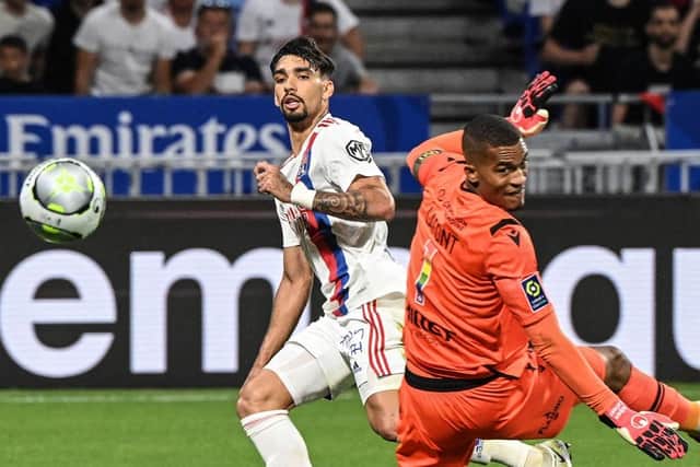 Lyons Brazilian midfielder Lucas Paqueta scores during the French L1 football match between Olympique Lyonnais (OL) and FC Nantes at The Groupama Stadium in Decines-Charpieu, central-eastern France on May 14, 2022. (Photo by OLIVIER CHASSIGNOLE / AFP) (Photo by OLIVIER CHASSIGNOLE/AFP via Getty Images)