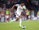 Cody Drameh of Leeds United runs with the ball during the Carabao Cup Second Round match between Leeds United and Barnsley at Elland Road on August 24, 2022 in Leeds, England. (Photo by George Wood/Getty Images)