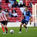 Sunderland's Tom Flanagan, left, watched by Wycombe's Anis Mehmeti, has started the season in superb form.