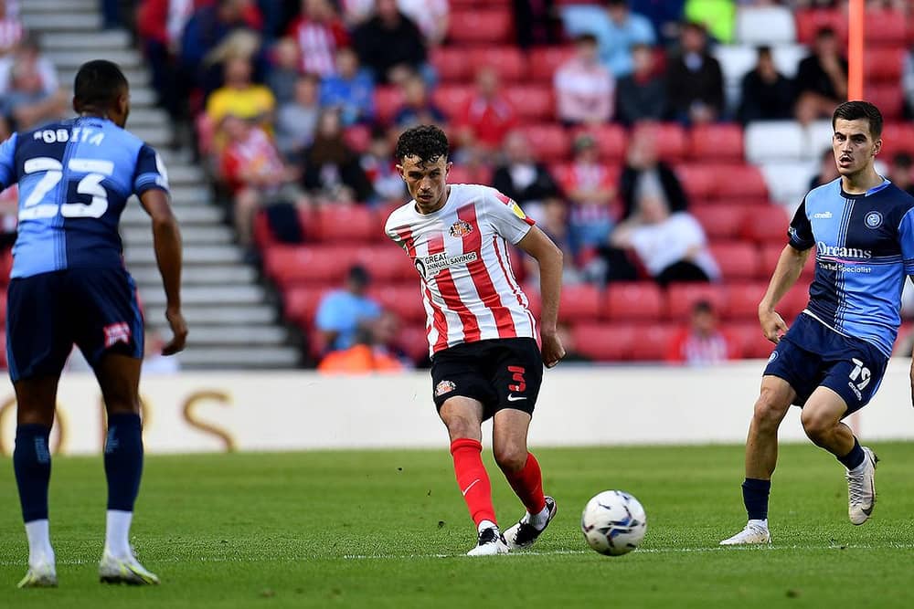 Sunderland's Tom Flanagan, left, watched by Wycombe's Anis Mehmeti, has started the season in superb form.