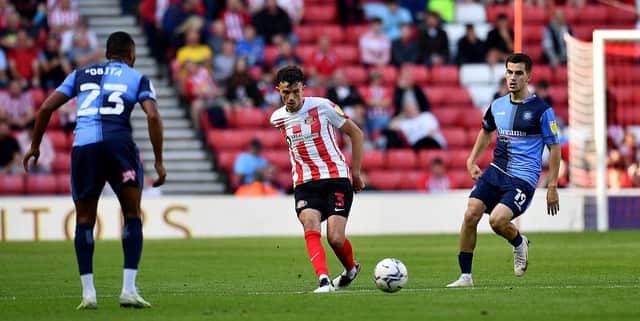 Sunderland's Tom Flanagan, left, watched by Wycombe's Anis Mehmeti, has started the season in superb form.