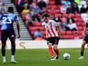 Sunderland's Tom Flanagan, left, watched by Wycombe's Anis Mehmeti, has started the season in superb form.