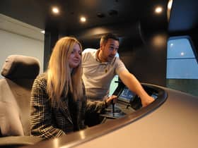 Nexus new Metro simulator for it new fleet of trains - Michael Darling at the controls with reporter Georgina Cutler.