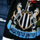 A Newcastle United scarf  (Photo by Alex Livesey/Getty Images)