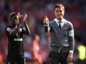 Scott Parker gestures to supporters after the English Premier League football match between Liverpool and Bournemouth at Anfield in Liverpool, north west England on August 27, 2022.(Photo by OLI SCARFF/AFP via Getty Images)