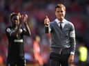 Scott Parker gestures to supporters after the English Premier League football match between Liverpool and Bournemouth at Anfield in Liverpool, north west England on August 27, 2022.(Photo by OLI SCARFF/AFP via Getty Images)
