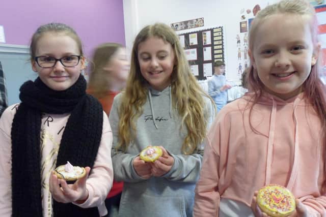 Some of the children with their cakes.