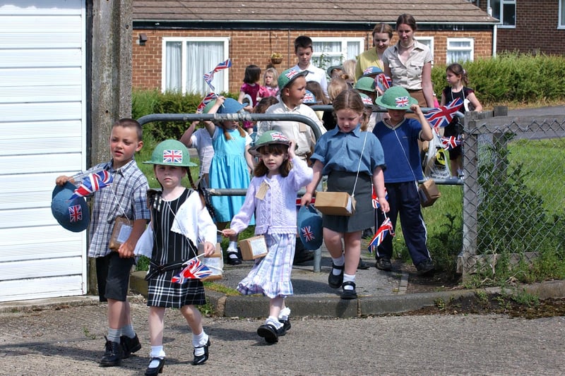 Staff and pupils from West Rainton Primary School dressed as evacuees as part of a Second World War project in 2005. Then they walked round their village and sang songs from the era.