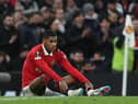 Manchester United's Marcus Rashford goes down during the Barcelona game.