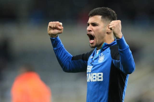 Newcastle United's Brazilian midfielder Bruno Guimaraes reacts to their win on the pitch after the English Premier League football match between Newcastle United and Wolverhampton Wanderers at St James' Park in Newcastle-upon-Tyne, north east England on April 8, 2022. (Photo by LINDSEY PARNABY/AFP via Getty Images)