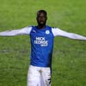 Mo Eisa of Peterborough United celebrates after scoring his second, Peterborough's third goal during the EFL Trophy match between Peterborough United and West Ham United.