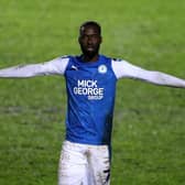 Mo Eisa of Peterborough United celebrates after scoring his second, Peterborough's third goal during the EFL Trophy match between Peterborough United and West Ham United.