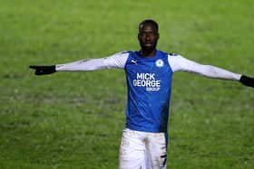 Mo Eisa of Peterborough United celebrates after scoring his second, Peterborough's third goal during the EFL Trophy match between Peterborough United and West Ham United.