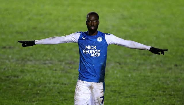 Mo Eisa of Peterborough United celebrates after scoring his second, Peterborough's third goal during the EFL Trophy match between Peterborough United and West Ham United.