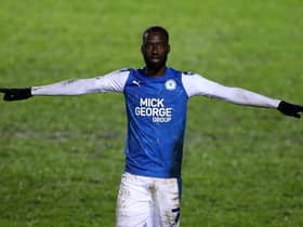 Mo Eisa of Peterborough United celebrates after scoring his second, Peterborough's third goal during the EFL Trophy match between Peterborough United and West Ham United.