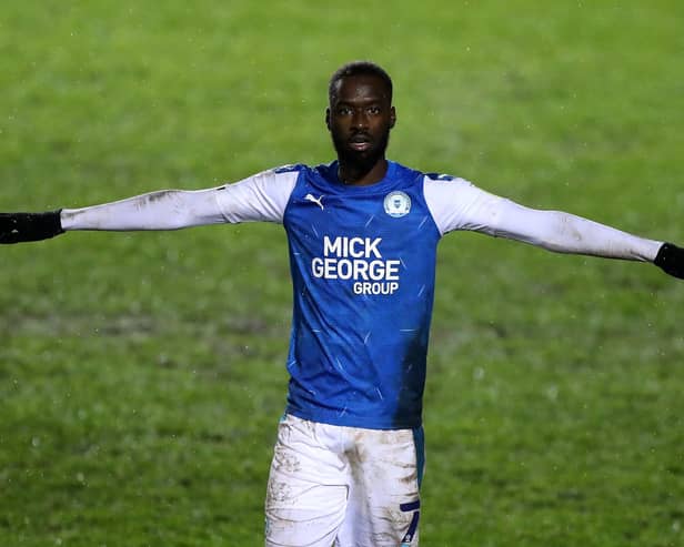 Mo Eisa of Peterborough United celebrates after scoring his second, Peterborough's third goal during the EFL Trophy match between Peterborough United and West Ham United.