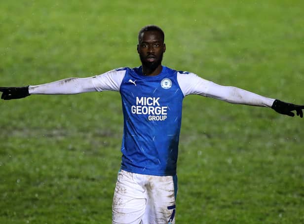 Mo Eisa of Peterborough United celebrates after scoring his second, Peterborough's third goal during the EFL Trophy match between Peterborough United and West Ham United.