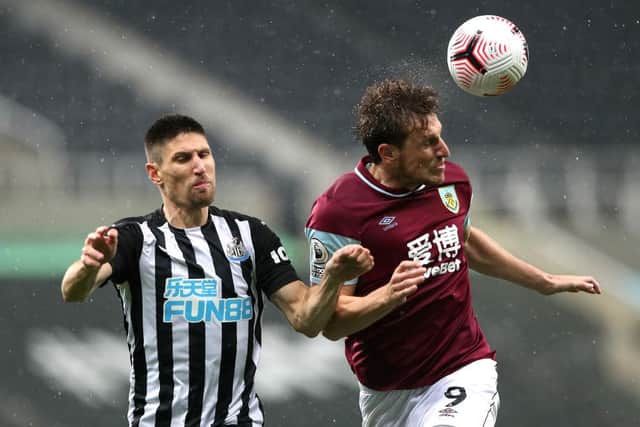 Chris Wood playing for Burnley against Newcastle United (Photo by Scott Heppell - Pool/Getty Images)