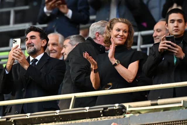 Manchester United's Ivorian midfielder Newcastle United's English minority owner Amanda Staveley (C) applauds the players ahead of the English League Cup final football match between Manchester United and Newcastle United at Wembley Stadium, north-west London on February 26, 2023. (Photo by Glyn KIRK / AFP)