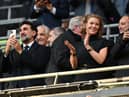 Manchester United's Ivorian midfielder Newcastle United's English minority owner Amanda Staveley (C) applauds the players ahead of the English League Cup final football match between Manchester United and Newcastle United at Wembley Stadium, north-west London on February 26, 2023. (Photo by Glyn KIRK / AFP)